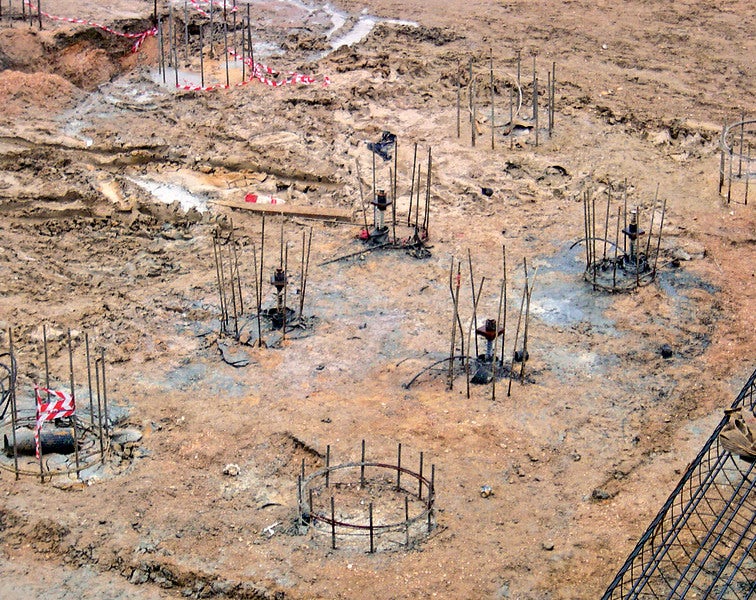 Tension Piles Used in the Base Slab of a Building in a Land Reclamation Area
